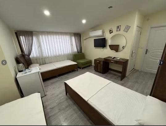 Deluxe Üç Kişilik Oda , Deniz ve Şehir Manzaralı, Klimalı 1