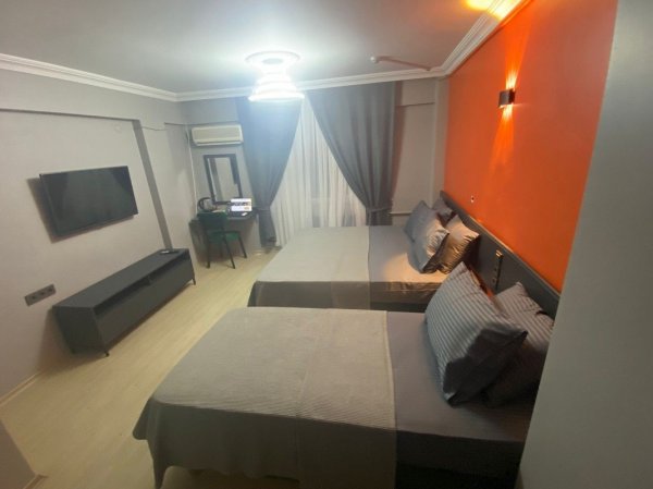 Deluxe Üç Kişilik Oda Şehir Manzaralı